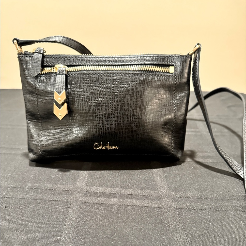 Cole Haan crossbody purse with gold accents